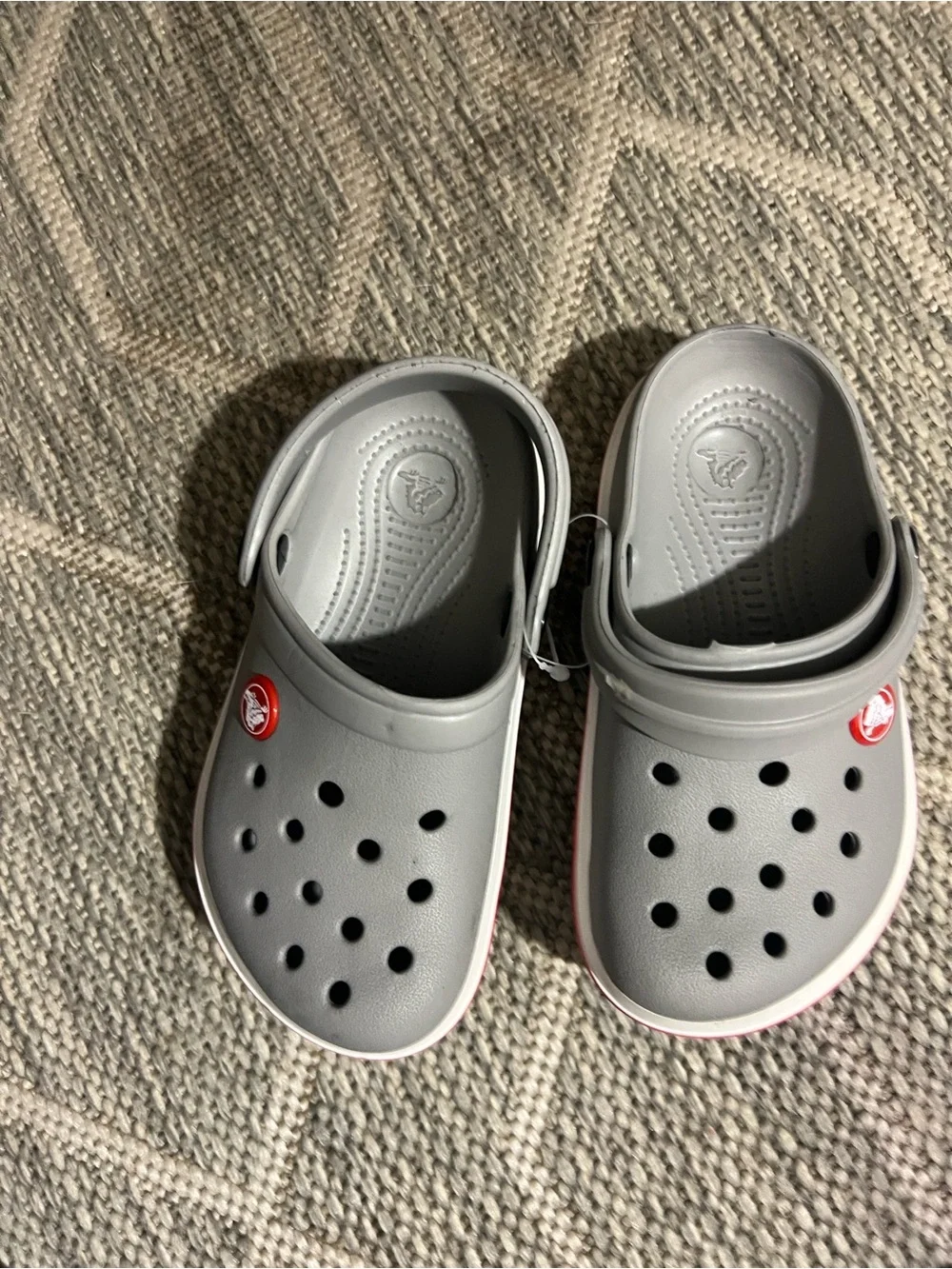 CROCS Kids' Classic Clog in Light Gray with Orange Stripe